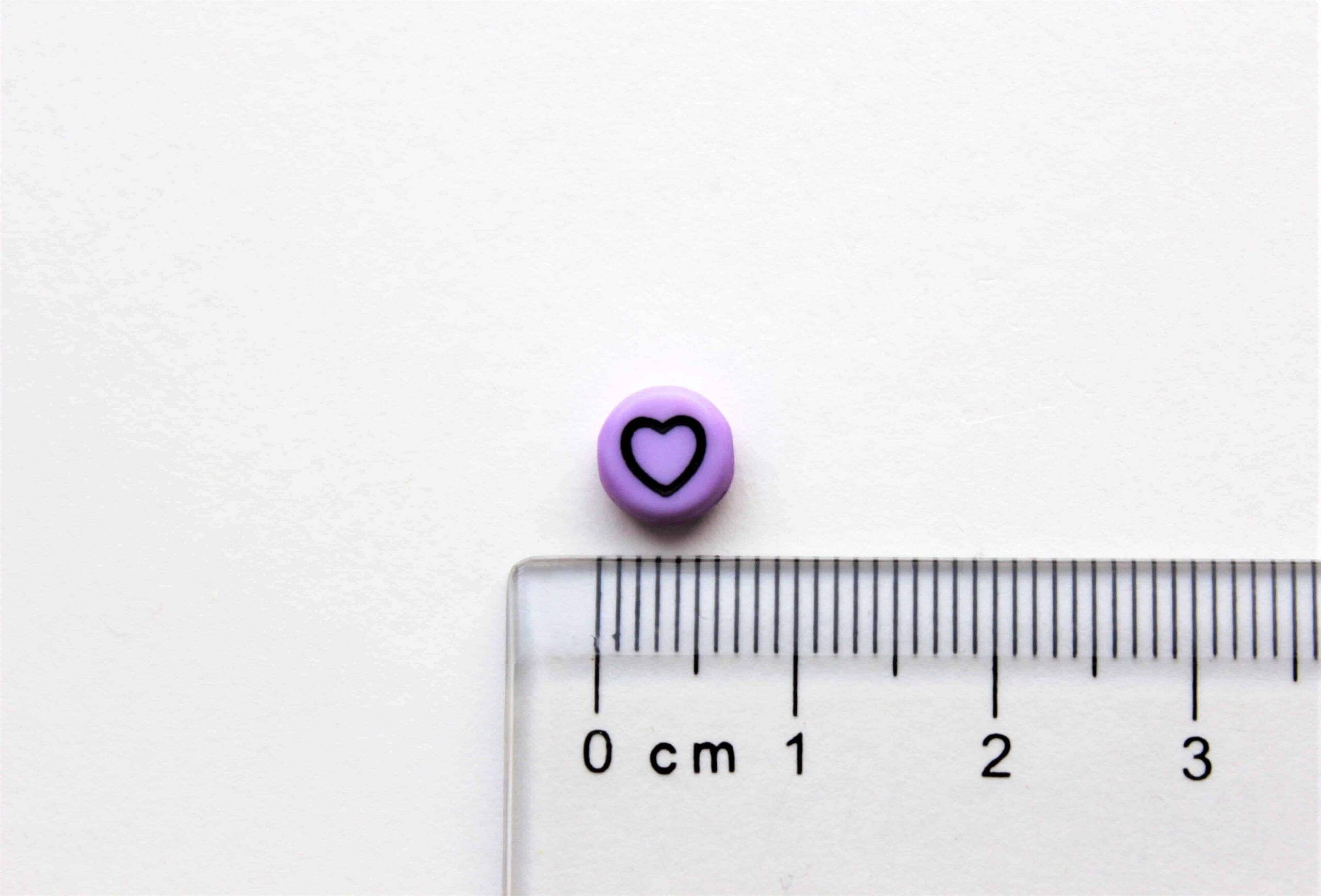 Akrylperler, runde, lys lilla, med ulike motiver. - Bilde 2