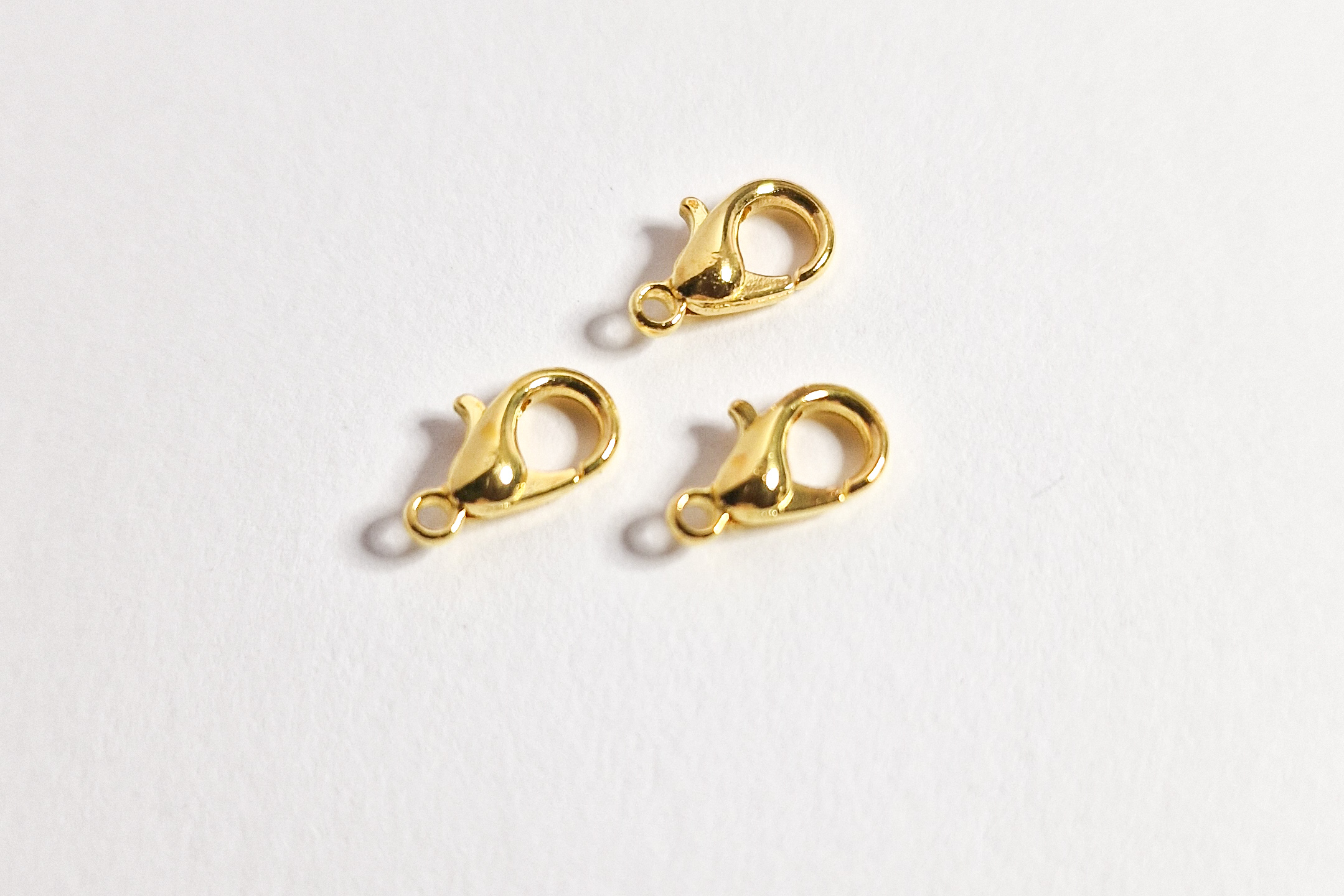 Låser, gullfarget, 10mm, 10pk
