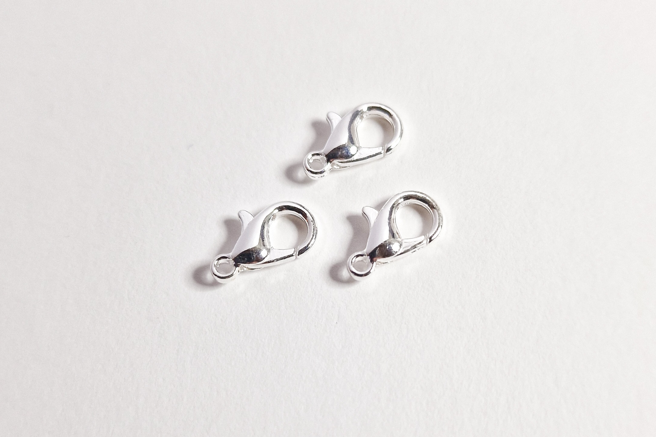 Låser, sølvfarget, 12mm, 5pk