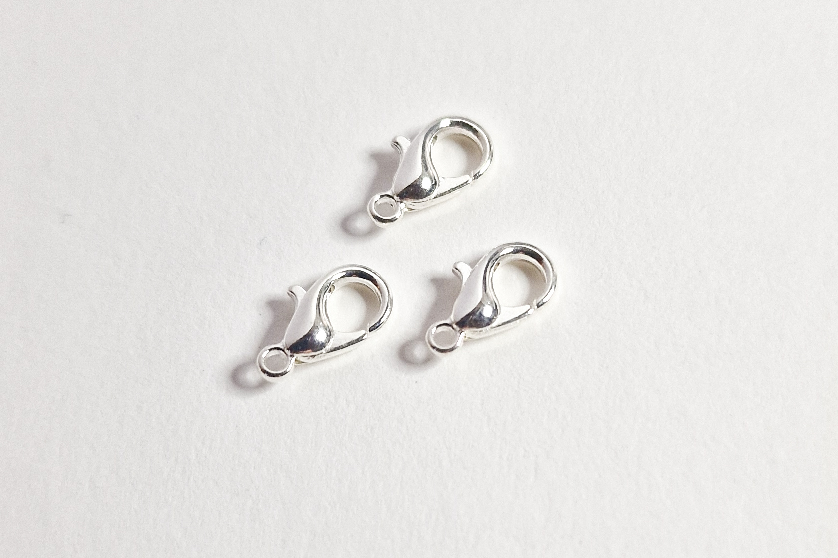 Låser, sølvfarget, 10mm, 5pk