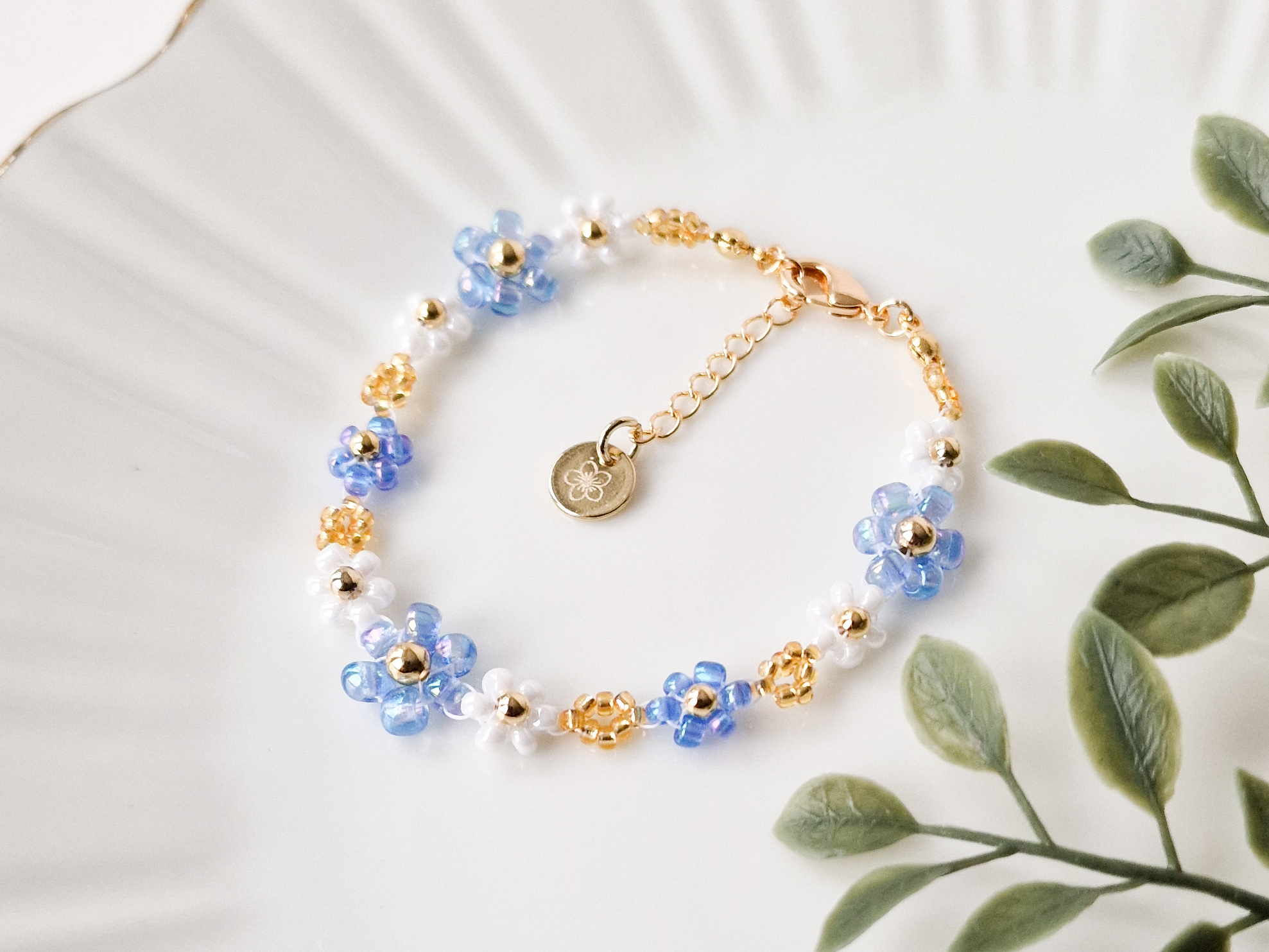Blomsterarmbånd med gullperler. - Bilde 6