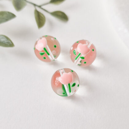 Glassperler, blanke med rosa blomst, 2pk