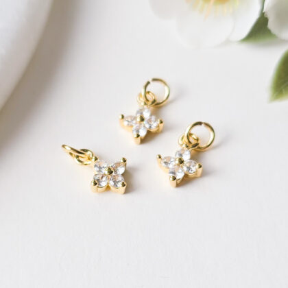 18k gullforgylt anheng, liten blomst